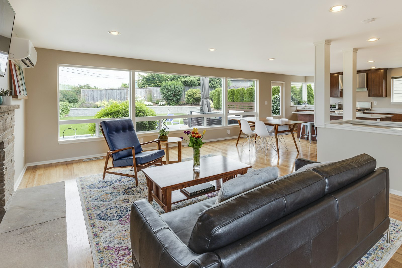 Open living space with natural hardwood flooring